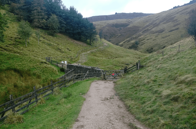 A bridge crosses a stream at the foot of Jacob's Ladder.